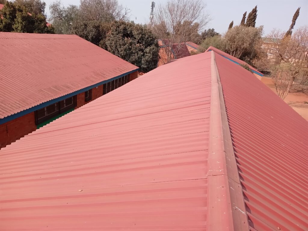 < img src="https://simplyhomeimprovements.com" roof painting>